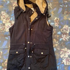 Black fur lined vest